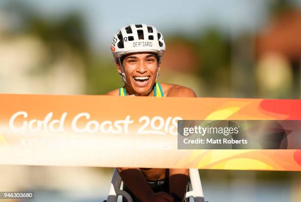 Madison de Rozario of Australia crosses the line to win gold in the Women's T54 marathon on day 11 of the Gold Coast 2018 Commonwealth Games at...