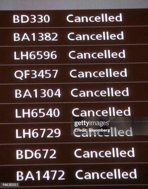 Departure board in Terminal 1 shows the majority of short-haul flights cancelled at Heathrow Airport, London, U.K., Thursday, December 21, 2006....