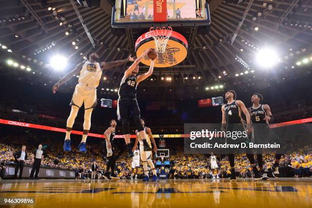 Davis Bertans of the San Antonio Spurs handles the ball against the Golden State Warriors in Game One of Round One during the 2018 NBA Playoffs on...