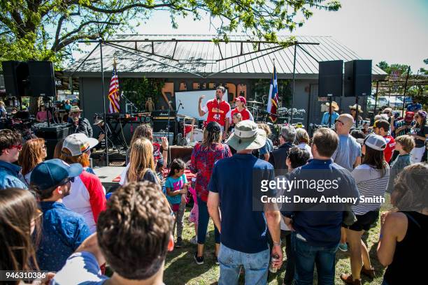 Rep. Beto O'Rourke gives a speech alongside his wife Amy Hoover Sanders during a fundraiser baseball game on April 14, 2018 in Austin, Texas....