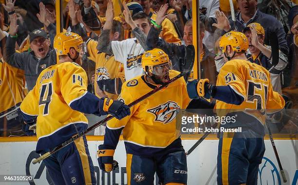 Austin Watson celebrates his goal with P.K. Subban and Mattias Ekholm of the Nashville Predators against the Colorado Avalanche in Game Two of the...