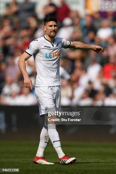 Swansea player Federico Fernandez reacts during the Premier League match between Swansea City and Everton at Liberty Stadium on April 14, 2018 in...