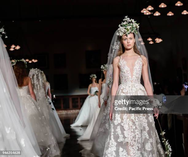Models walk runway for Reem Acra Bridal Spring/Summer 2019 collection during NY Bridal Wweek at NY Public Library, Manhattan.
