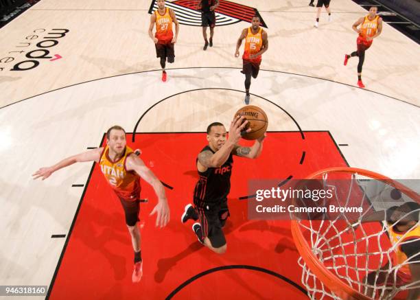 Shabazz Napier of the Portland Trail Blazers dunks the ball during the game against the Utah Jazz on April 11, 2018 at the Moda Center Arena in...