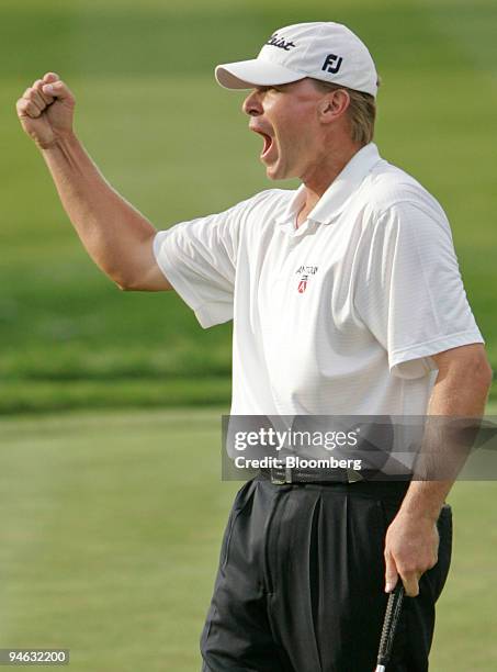 Golfer Steve Stricker reacts after sinking a birdie putt on the 18th hole of Barclays Classic golf tournament at Westchester Country Club in Rye, New...