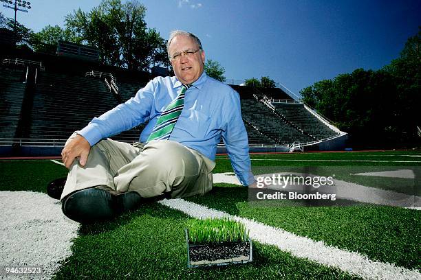 John Gilman, president and founder of Montreal-based Fieldturf, sits on the field at the Percival Molson Memorial Stadium in Montreal, Quebec,...