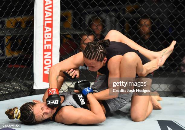 Michelle Waterson punches Cortney Casey in their womens strawweight fight during the UFC Fight Night event at the Gila Rivera Arena on April 14, 2018...