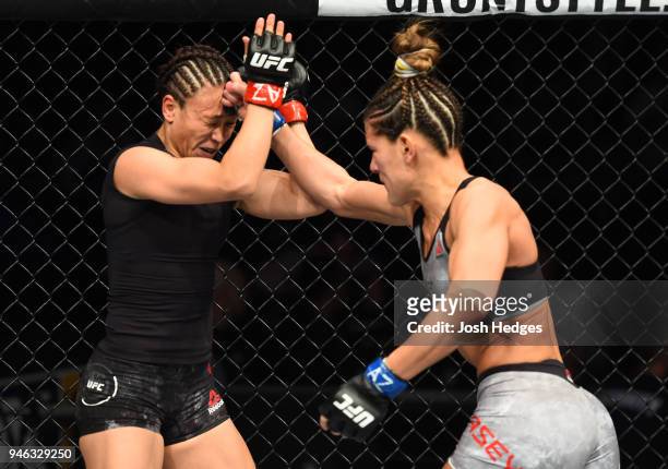 Cortney Casey punches Michelle Waterson in their womens strawweight fight during the UFC Fight Night event at the Gila Rivera Arena on April 14, 2018...
