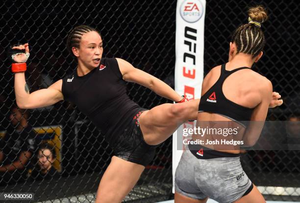 Michelle Waterson kicks Cortney Casey in their womens strawweight fight during the UFC Fight Night event at the Gila Rivera Arena on April 14, 2018...