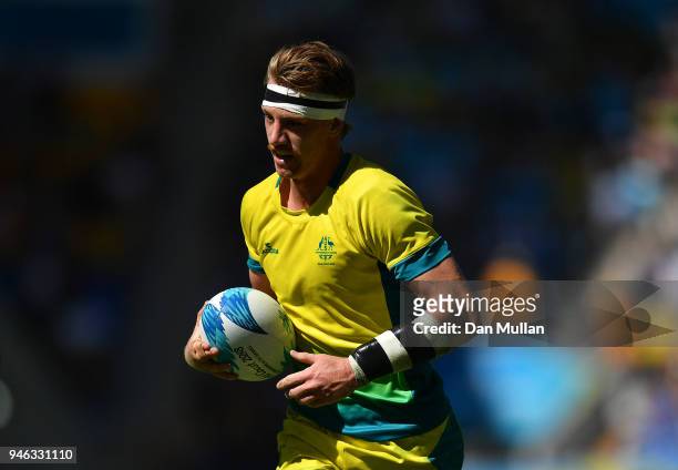 Ben O'Donnell of Australia runs in for a try during the Rugby Sevens Men's Placing 5-8th match between Australia and Kenya on day 11 of the Gold...