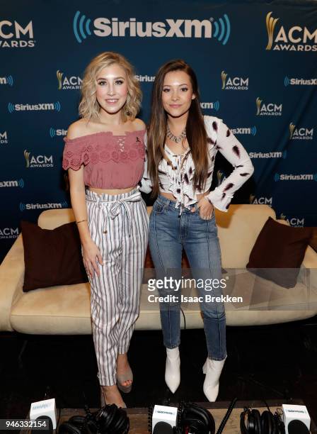 Madison Marlow and Taylor Dye of Maddie and Tae attend SiriusXM's The Highway channel broadcast backstage at the Academy of Country Music Awards on...