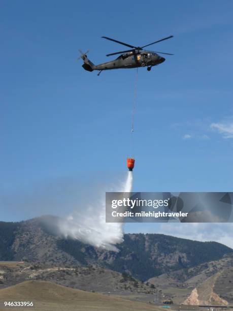colorado army national guard firefighter training black hawk helicopter drops water bear creek lake park colorado - sikorsky uh 60 black hawk stock pictures, royalty-free photos & images