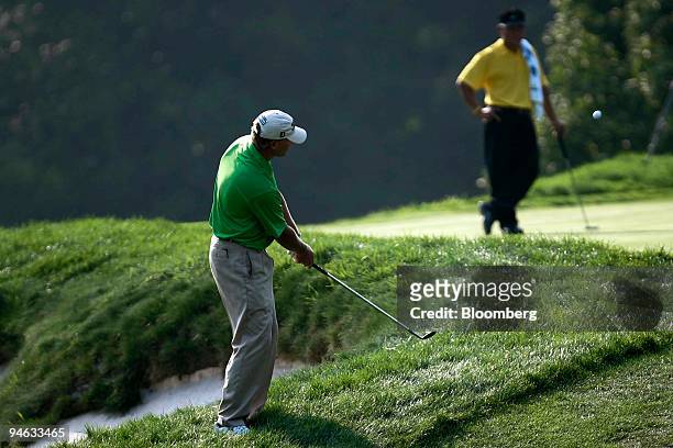 Golfer Steve Stricker hits out of the rough on the 14th hole during the third round of the Barclays Classic golf tournament at Westchester Country...