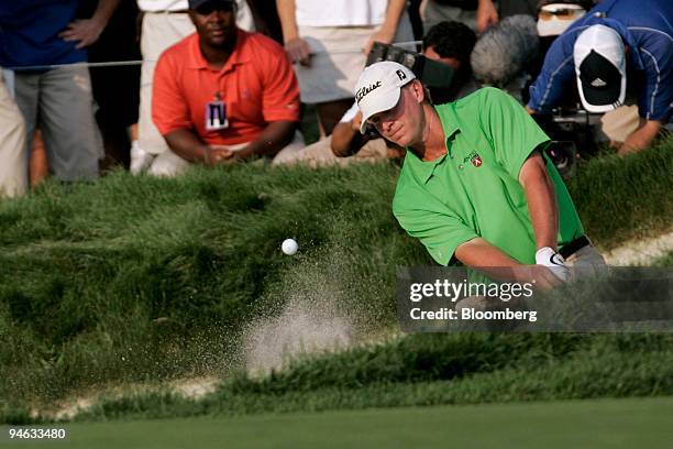 Golfer Steve Stricker hits out of a bunker on the 18th hole during the third round of the Barclays Classic golf tournament at Westchester Country...