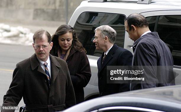 Lewis 'Scooter' Libby, second from right, former chief of staff to US Vice President Dick Cheney, his wife, Harriet Grant, and his defense team,...