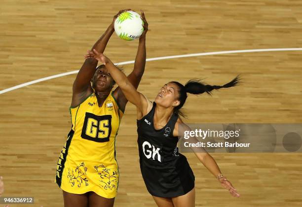 Jhaniele Fowler-Reid of Jamaica and Temalisi Fakahokotau of New Zealand compete for the ball during the Netball Bronze Medal Match on day 11 of the...