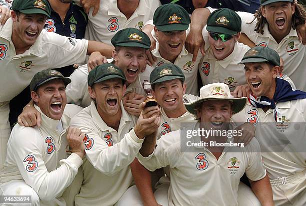 The Australian cricket team celebrate after claiming victory against England in reclaiming the Ashes trophy, on day 5 of the third Ashes Test match...