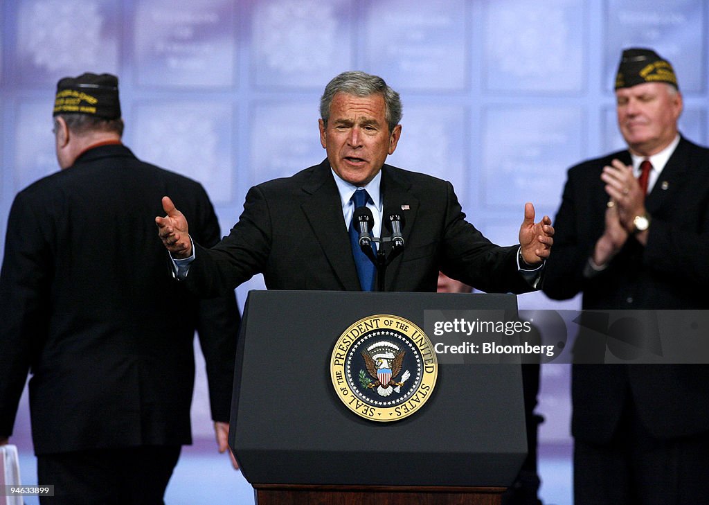 U.S. President George W. Bush, center, speaks during the Vet