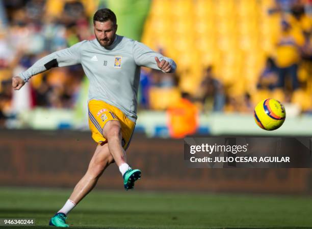 Tigres's French player Andre-Pierre Gignac warms up before the start of the Mexican Clausura football tournament match against Cruz Azul, at the...
