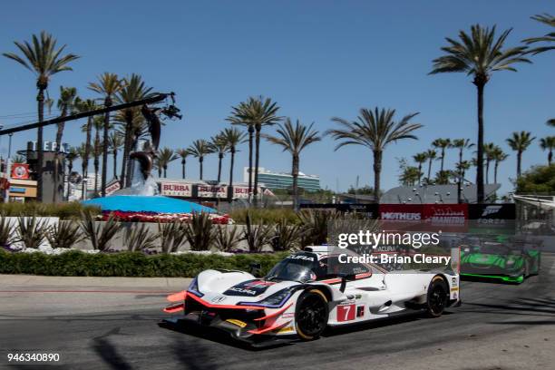 The Acura DPi of Ricky Taylor and Helio Castroneves, of Brazil, races on the track during the IMSA Bubba Burger Grand Prix of Long Beach on April 14,...