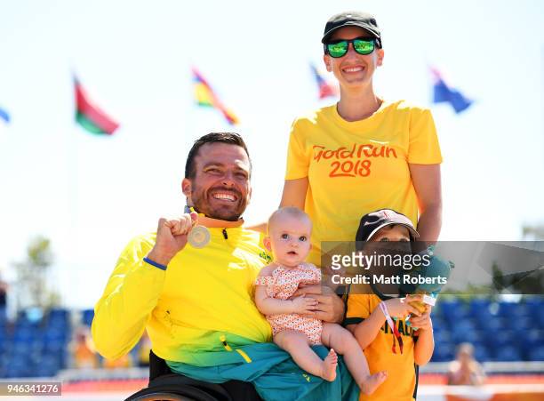 Gold medalist Kurt Fearnley of Australia celebrates with wife Sheridan, son Harry and daughter Emilia during the medal ceremony for the Mens T54...