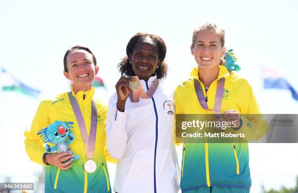 Silver medalist Lisa Weightman of Australia, gold medalist Helalia Johannes of Namibia and bronze medalist Jessica Trengove of Australia pose during...