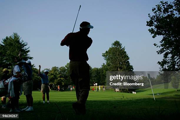 Professional golfer Vijay Singh hits out of the rough on the 15th hole of the Barclays Classic tournament at Westchester Country Club in Rye, New...