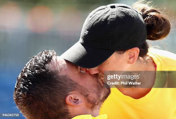 Kurt Fearnley of Australia celebrates on the podium with his Wife Sheridon, following gold in the men's T54 marathon on day 11 of the Gold Coast 2018...