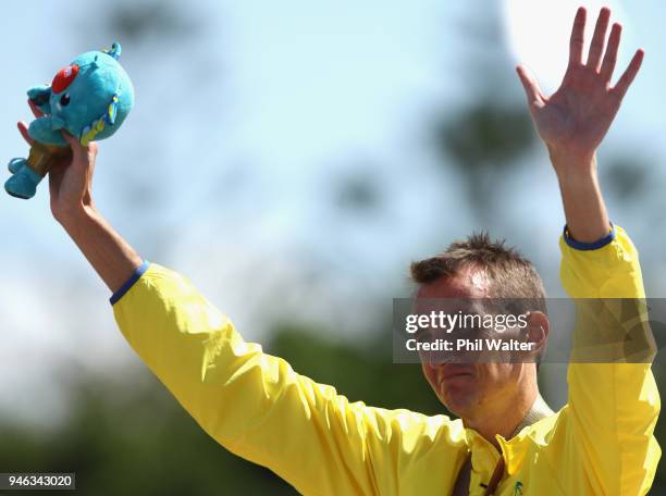 Michael Shelley of Australia celebrates his gold medal on the podium following the Men's marathon on day 11 of the Gold Coast 2018 Commonwealth Games...