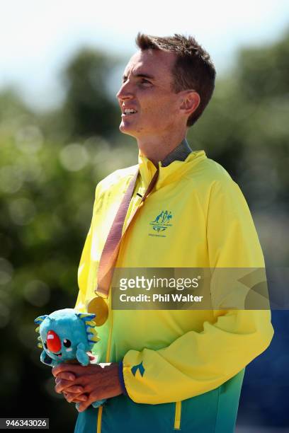 Michael Shelley of Australia celebrates his gold medal on the podium following the Men's marathon on day 11 of the Gold Coast 2018 Commonwealth Games...