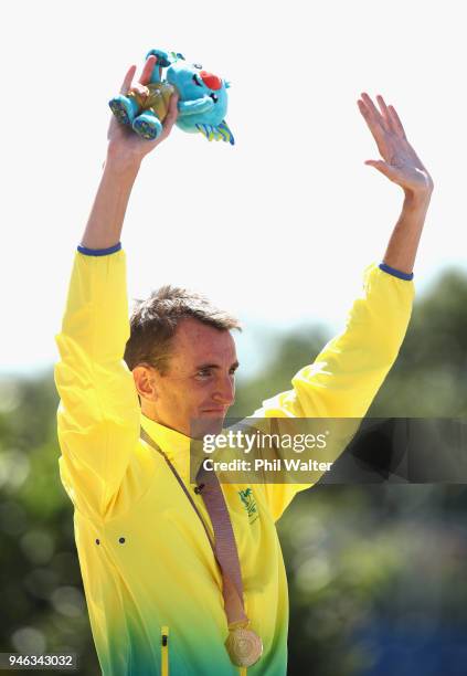 Michael Shelley of Australia celebrates his gold medal on the podium following the Men's marathon on day 11 of the Gold Coast 2018 Commonwealth Games...