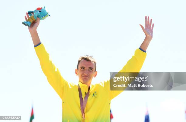 Gold medalist Michael Shelley of Australia celebrates during the medal ceremony for the Mens marathon on day 11 of the Gold Coast 2018 Commonwealth...