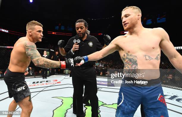 Dustin Poirier and Justin Gaethje touch gloves in their lightweight fight during the UFC Fight Night event at the Gila Rivera Arena on April 14, 2018...