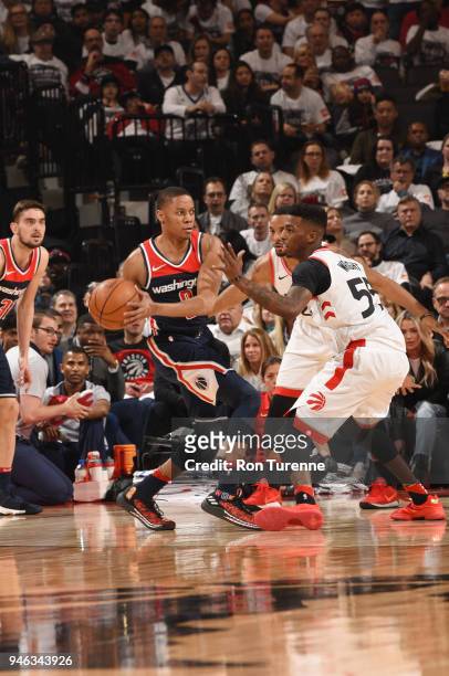 Tim Frazier of the Washington Wizards handles the ball against the Toronto Raptors in Game One of Round One of the 2018 NBA Playoffs on April 14,...