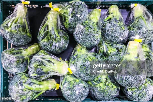 broccoli packaged in small plastic bag - small plastic bag stock pictures, royalty-free photos & images