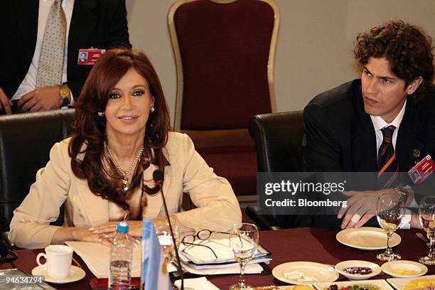 Cristina Fernandez de Kirchner, left, Argentina's president, and Martin Lousteau, Argentina's economy minister, attend the XXXIV Mercosur Summit in...
