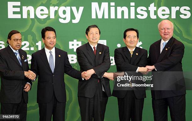 Left to right: Engery leaders including Murli Deora , India's Petroleum Minister, Akira Amari, Japan's Minister of Economy, Trade and Industry , Ma...