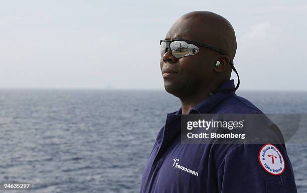 Transocean worker Larry Clayton mans the helideck aboard Discoverer Deep Seas, a Transocean deepwater drill ship, Monday, December 11 in the Gulf of...