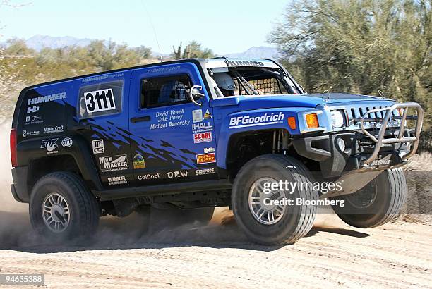 Hummer H3 is driven by Rod Hall on a dirt track in Bouse, Arizona, Saturday, Feb. 17, 2007. This year Rod Hall will celebrate his 70th birthday just...