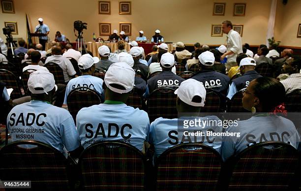 Election observers attend a media briefing in Maseru, Lesotho on Sunday, Feb. 18, 2007. Voters in the southern African kingdom of Lesotho queued for...