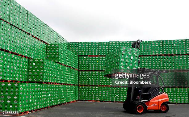 Fork lift truck moves Heineken beer crates at the Heineken brewery in Zoeterwoude, The Netherlands, Thursday, Aug. 23, 2007. The head on Heineken NV...