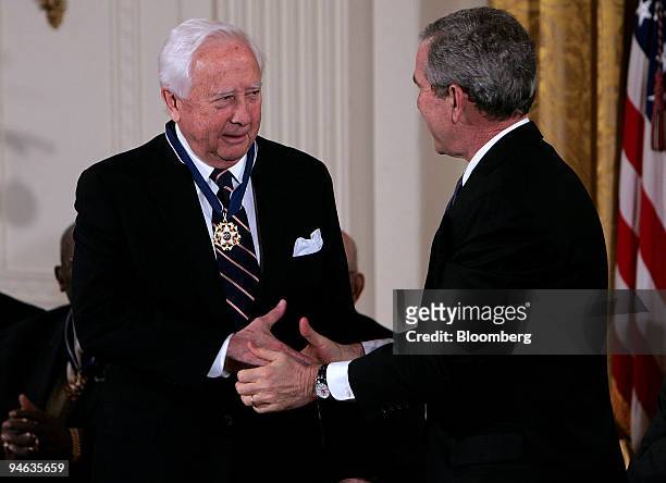 President George W. Bush, right, presents the Presidential Medal of Freedom to David McCullough in the East Room of the White House in Washington,...