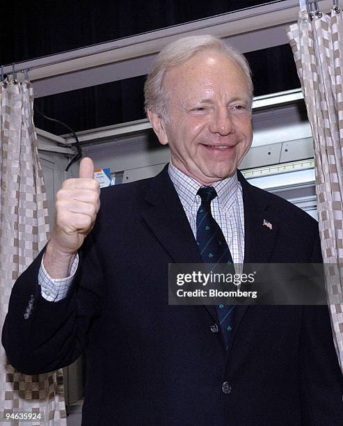 Senator Joe Lieberman gives a thumbs up after voting in the Connecticut Democratic primary in New Haven, Connecticut, Tuesday, August 8, 2006. The...