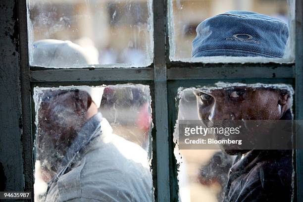 People wait in line to cast their ballots in Maseru, Lesotho, on Saturday, Feb. 17, 2007. Voters in the southern African kingdom began queuing at...