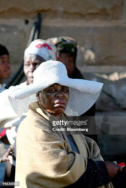 People wait in line to cast their ballots in Maseru, Lesotho, on Saturday, Feb. 17, 2007. Voters in the southern African kingdom began queuing at...