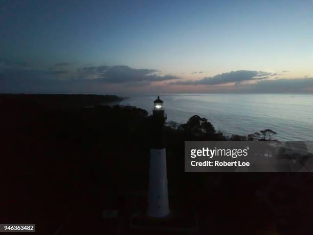 hunting island light house 3 - sun sun sea sand cloud night fotografías e imágenes de stock