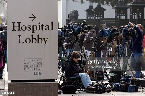 Television cameras are set up on the sidewalk outside George Washington University Hospital in Washington, D.C. Thursday, December 14, 2006. The...