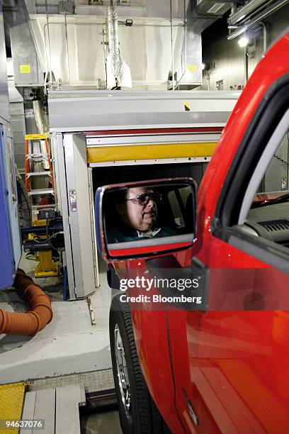 Bill Tyler, a senior lab technician sits behind the wheel of a Hummer H3 at the General Motors Milford Proving Ground in Milford, Michigan, Monday,...