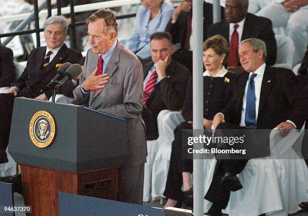 Former President George H. W. Bush addresses a crowd including President George W. Bush and First Lady Laura Bush, at the Northrop Grumman shipyard...