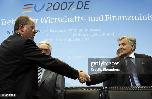 German Finance Minister Peer Steinbrueck, left, shakes hands German Finance Minister Peer Steinbrueck, left, shakes hands